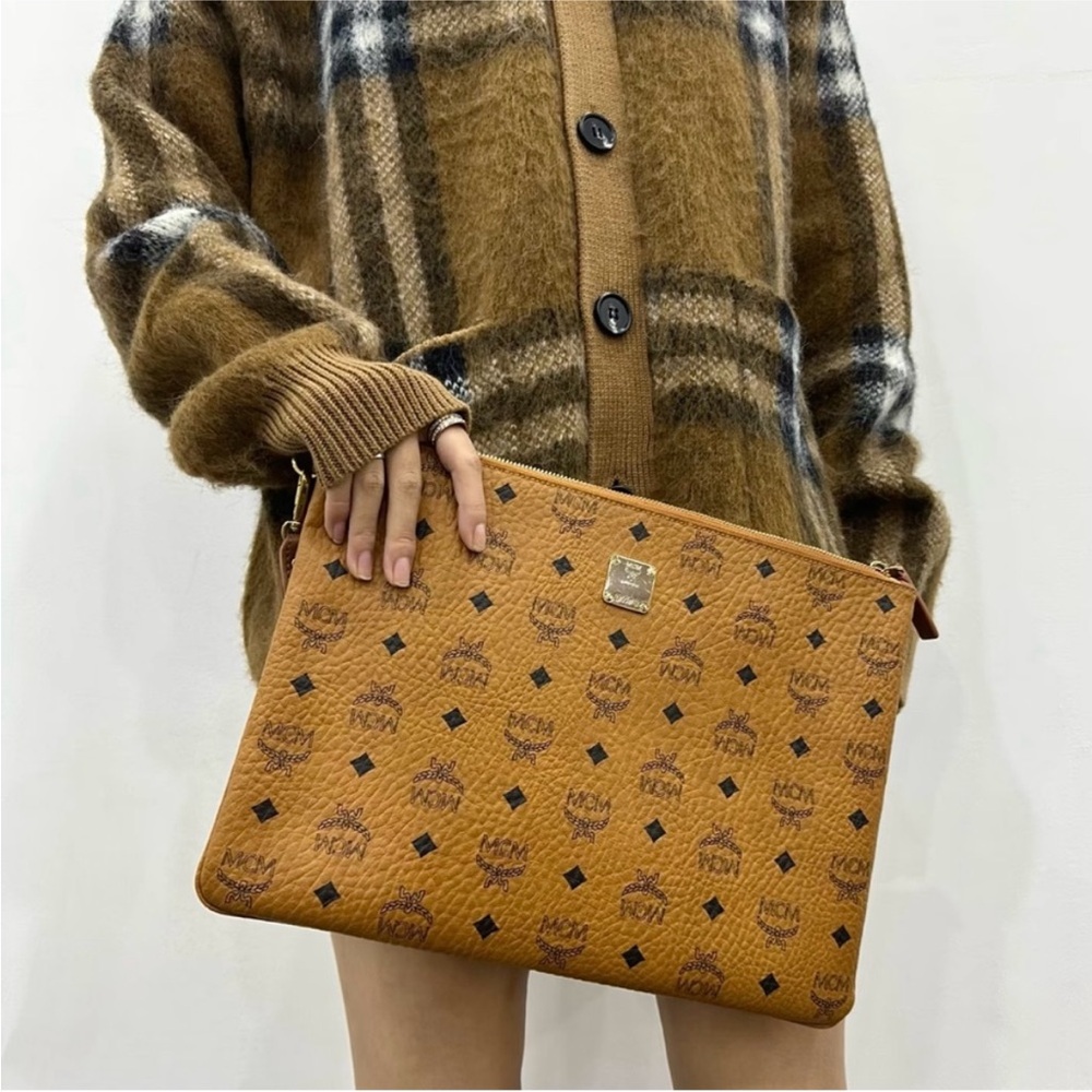 Authentic MCM Brown Monogram large Clutch